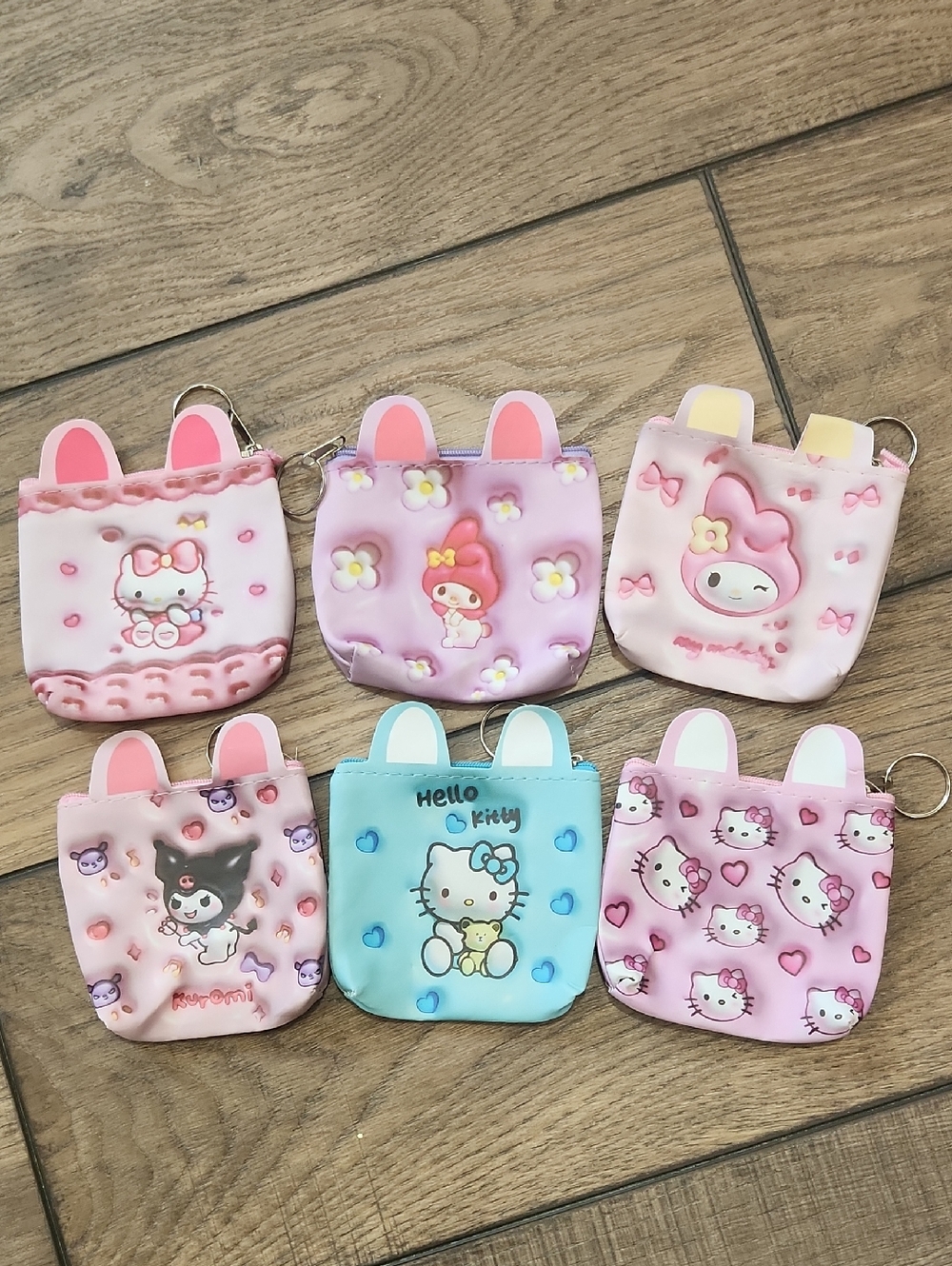 Sanrio Mini Silicone Bunny-Ear Coin Pouches in Pink, Light Purple & Blue
